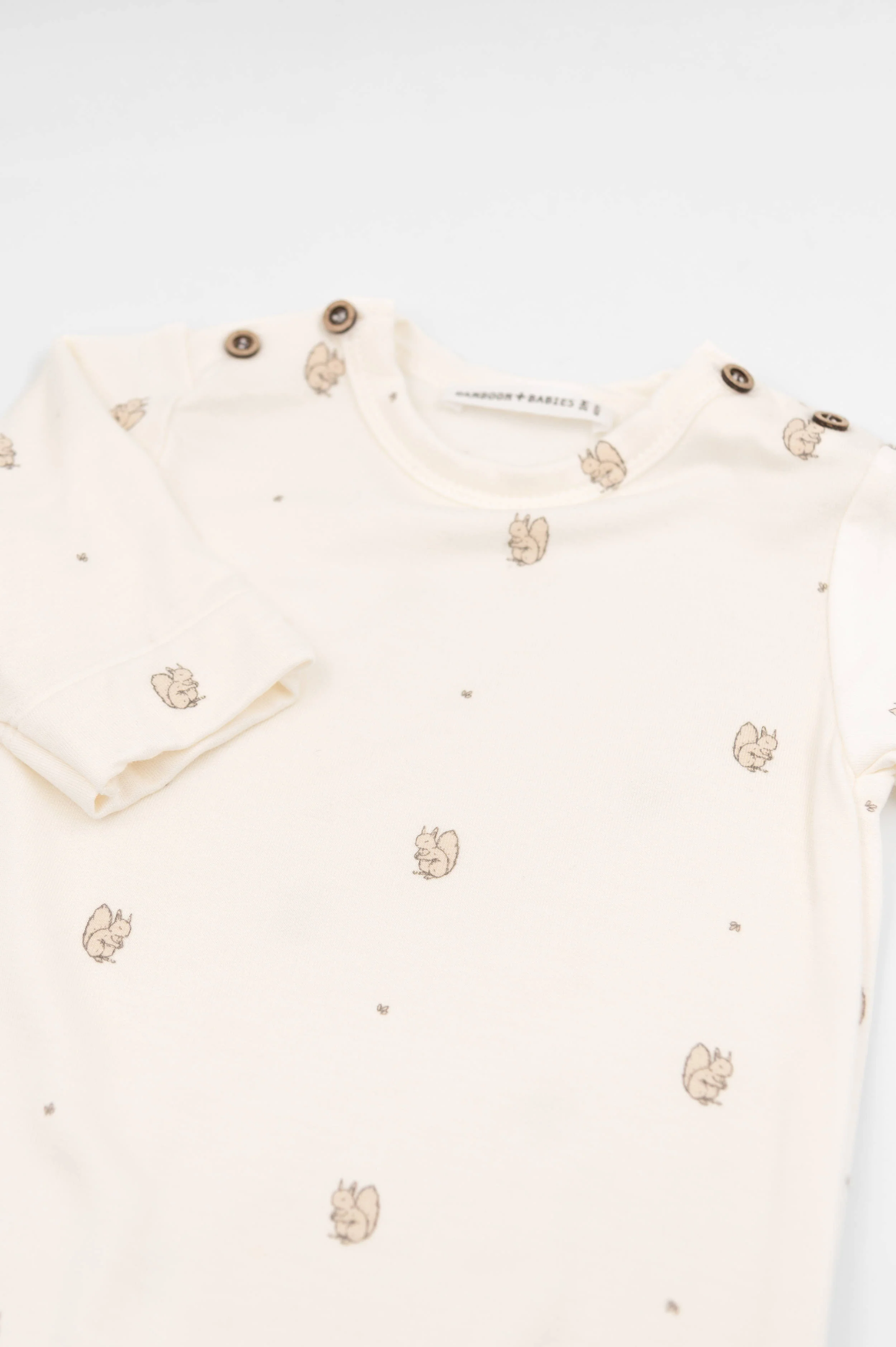 Tutina lineare con apertura spalla con piedi - Print Squirrel